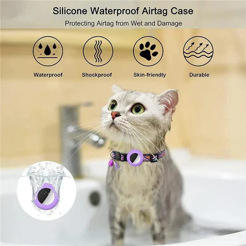 Adjustable nylon dog collar with bell and waterproof Airtag holder on a cat