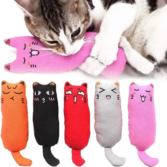 Cat playing with pink rustle sound catnip toy among five plush cat-shaped kitten toys in various colors