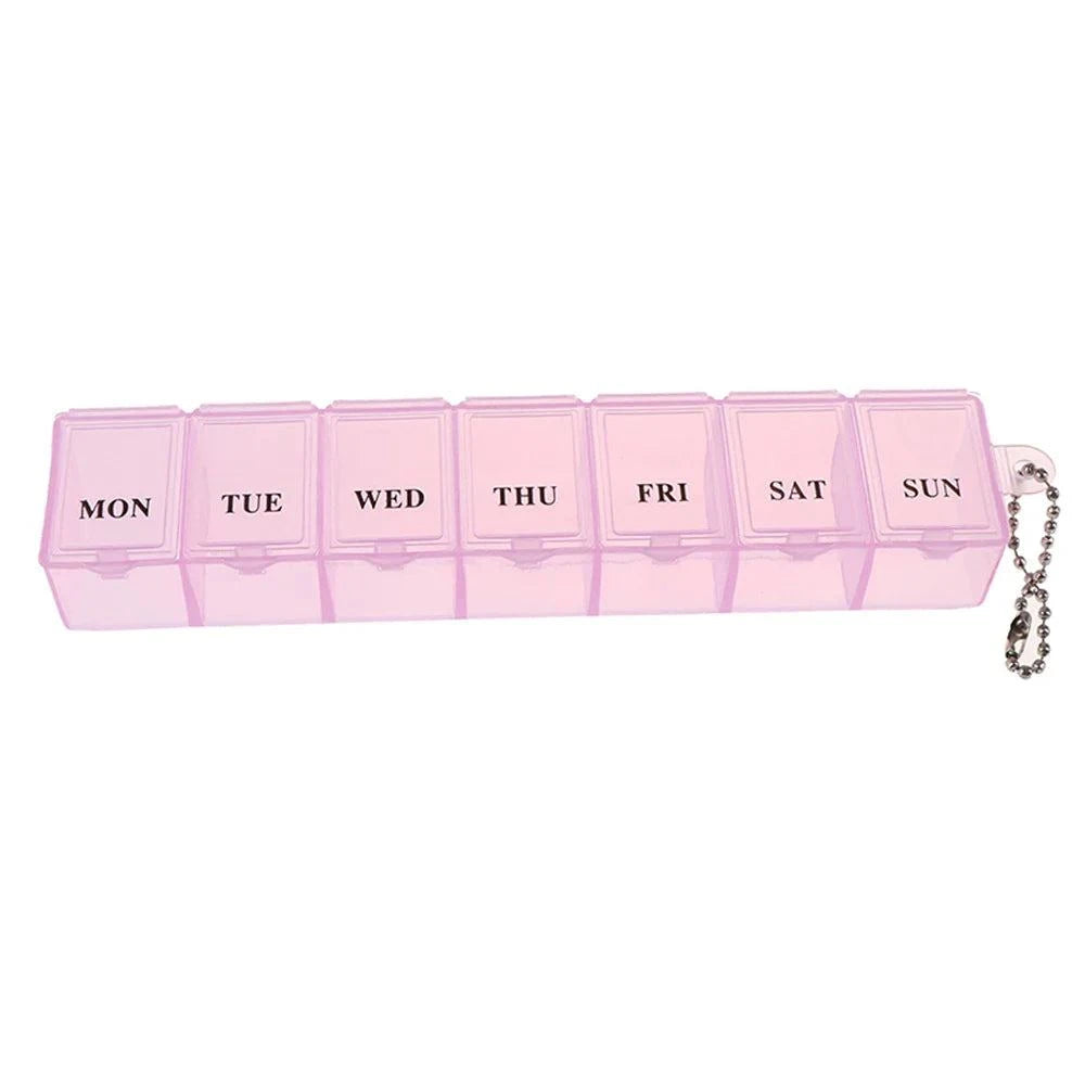 Pink 7-day pill box organizer with 21 compartments for daily vitamins and medicines