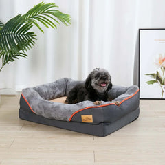 Gray orthopedic foam dog bed with cotton-padded bolster and removable cover featuring waterproof and solid design