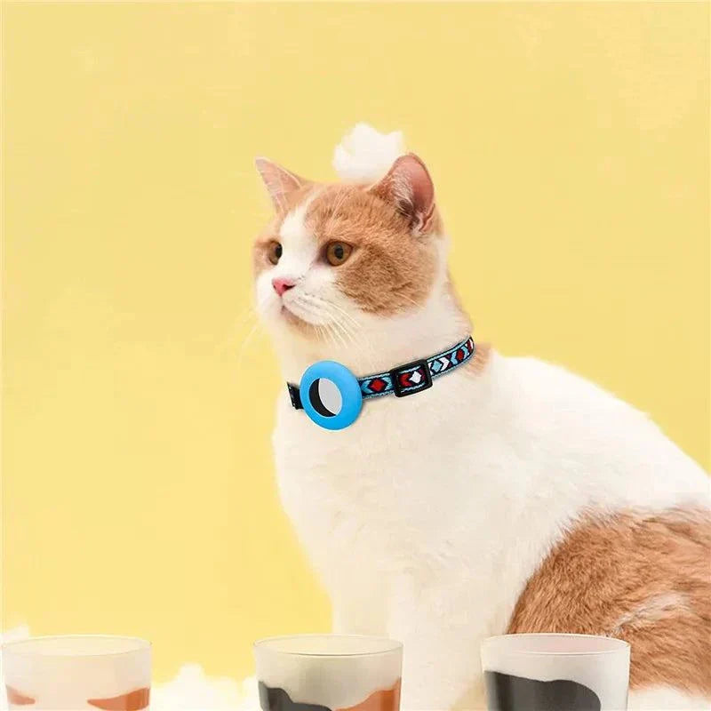 Adjustable nylon dog collar with bell and airtag holder on cat