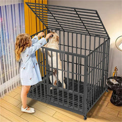 XXL large heavy duty dog crate with tear resistant metal bars, lockable wheels, and tray, shown with child and dog inside in home setting