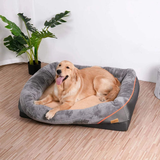 Golden retriever lying on a super soft orthopedic foam dog bed with cotton-padded bolster and removable cover