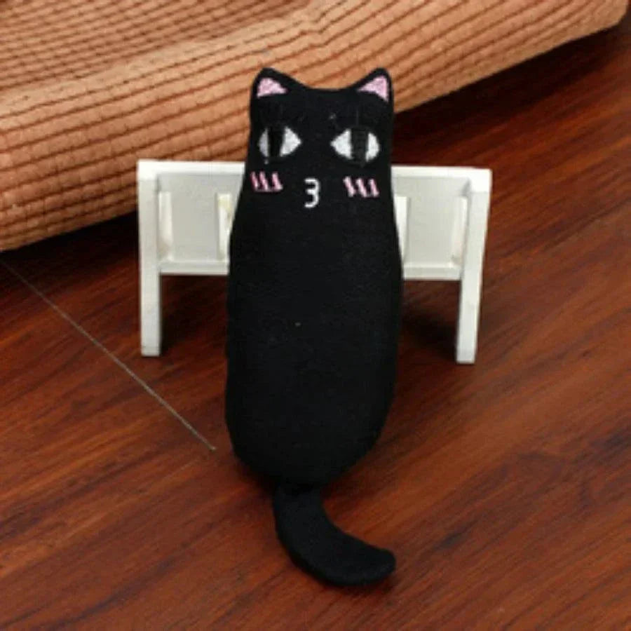Black plush catnip toy with rustle sound for cats and kittens, designed for teeth grinding and pet play.